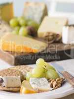 Plate of Cheese and Biscuits with a Cheese Board