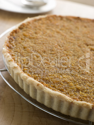 Whole Treacle Tart on a Cooling Rack