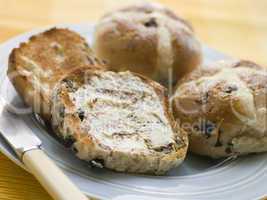 Plate of Toasted Hot Cross Buns with Butter