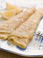 Plate of Folded Pancakes Lemon and Sugar