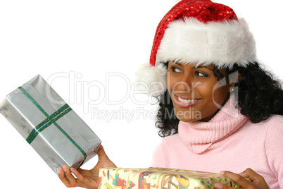 Beautiful brazilian girl with christmas presents