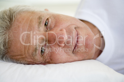 Man lying in bed