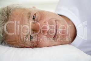 Man lying in bed