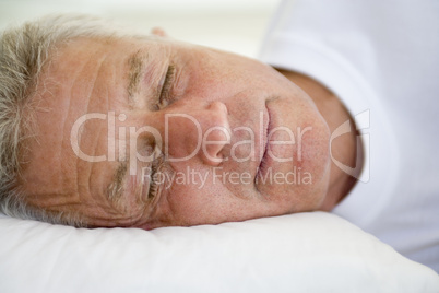 Man lying in bed sleeping