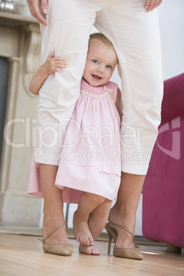 Mother in living room with baby