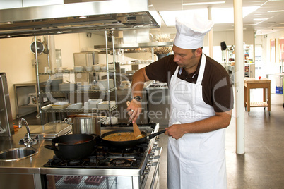 Stirring the pasta sauce