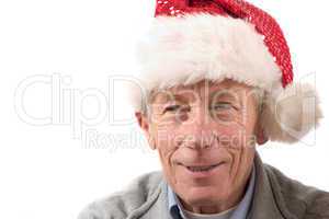 Smiling older man with santa hat