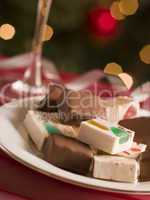 Plate of Chocolate Dipped and Plain Nougat