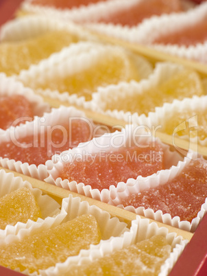 Jellied fruits in paper cases
