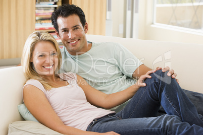 Couple on sofa at home