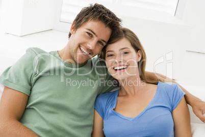 Couple in living room smiling