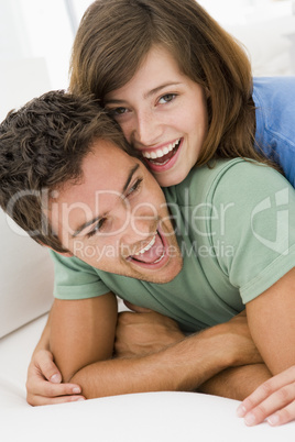 Couple in living room smiling