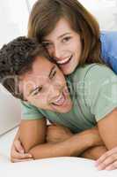 Couple in living room smiling