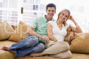 Couple in living room smiling