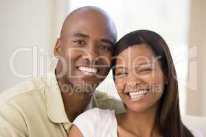 Couple in living room smiling