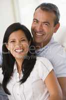 Couple in living room smiling