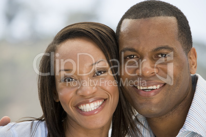 Couple outdoors smiling