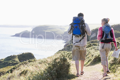 Couple on cliffside outdoors walking