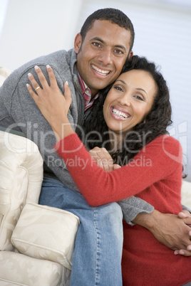 Couple in living room smiling