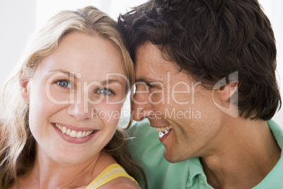 Couple in living room smiling