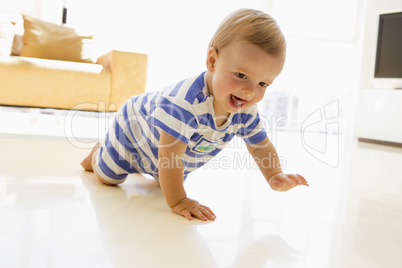 Baby crawling in living room