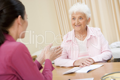 Woman in doctor's office smiling