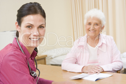 Woman in doctor's office smiling