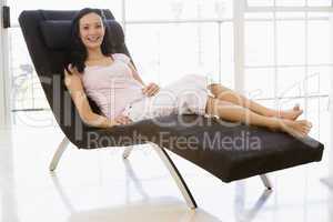 Woman sitting in chair smiling