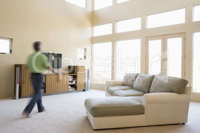 Man walking through living room