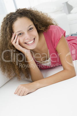 Woman lying in living room