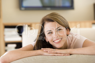 Woman lying in living room