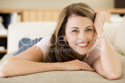 Woman lying in living room