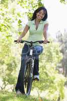 Woman on bicycle smiling