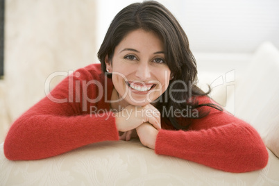 Woman sitting in living room