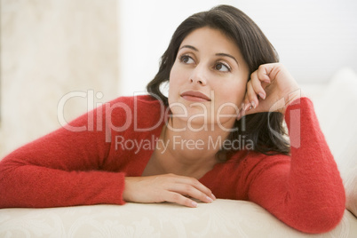 Woman sitting in living room