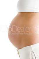 Pregnant woman's exposed belly