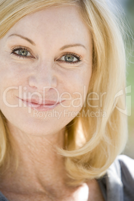 Head shot of woman smiling