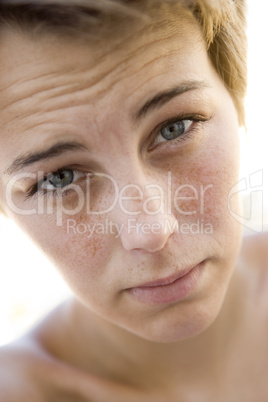 Head shot of sad woman