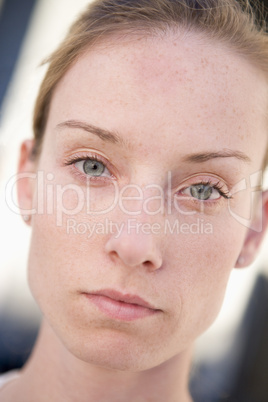 Head shot of woman thinking