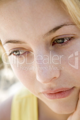 Head shot of woman thinking