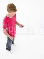 Young boy using cellular phone