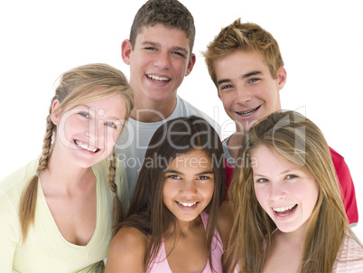 Five friends together smiling