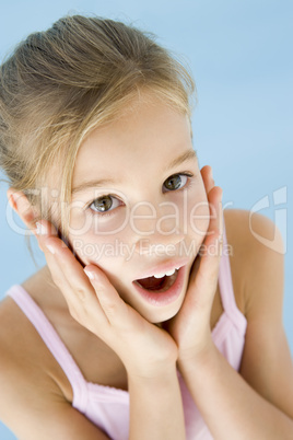 Young girl excited and surprised