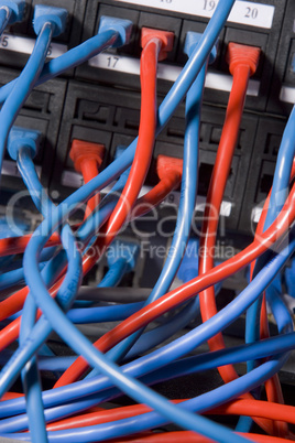 Computer Cables Chaotically Plugged In To The Back Of A Server