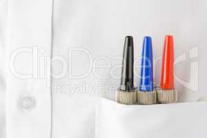 Close Up Of 3 Pens Neatly Sitting In A Mans White Shirt Pocket