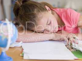 Young Girl Asleep On Her Homework