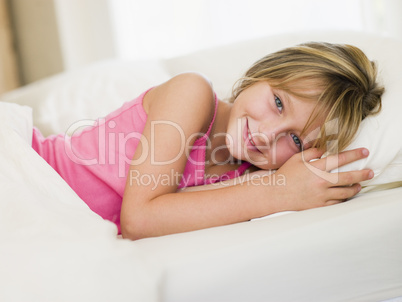 Young Girl Lying In Her Bed