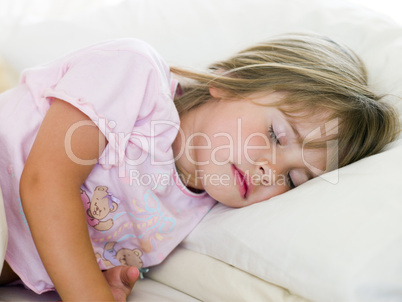 Young Girl Sleeping In Her Bed