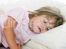 Young Girl Sleeping In Her Bed