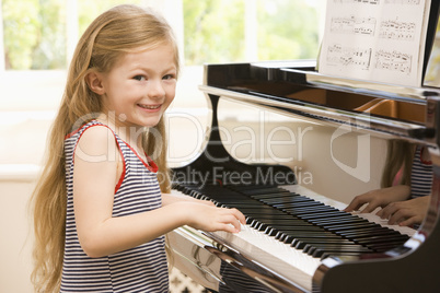 Young Girl Playing Piano